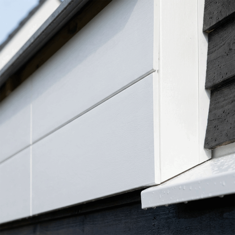 Detail van kunststof gevelplaat voor dakkapel met nette randen en egale structuur.