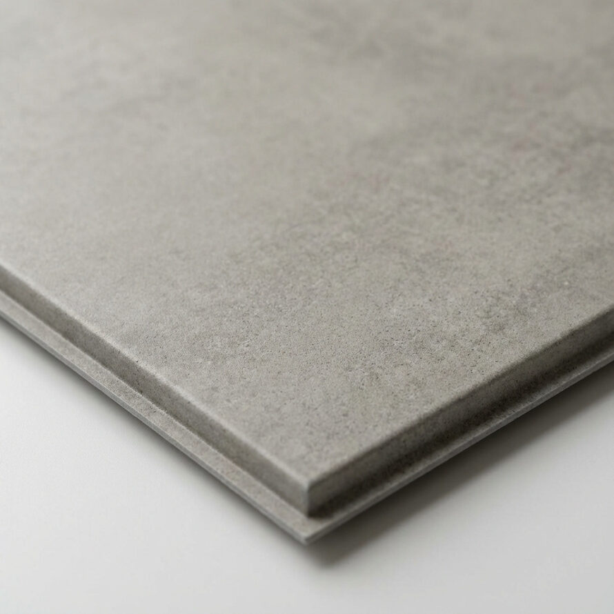 Close-up van kunststof betonlook wandpaneel met realistische betonstructuur.